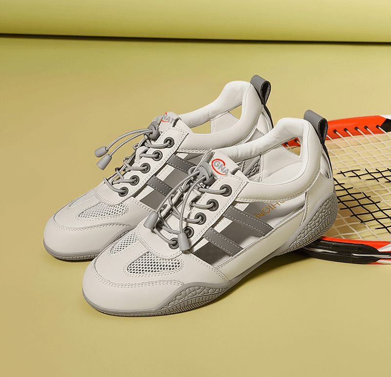 Soft-soled breathable casual flats running shoes with lace-up design, featuring split leather upper and mesh lining.